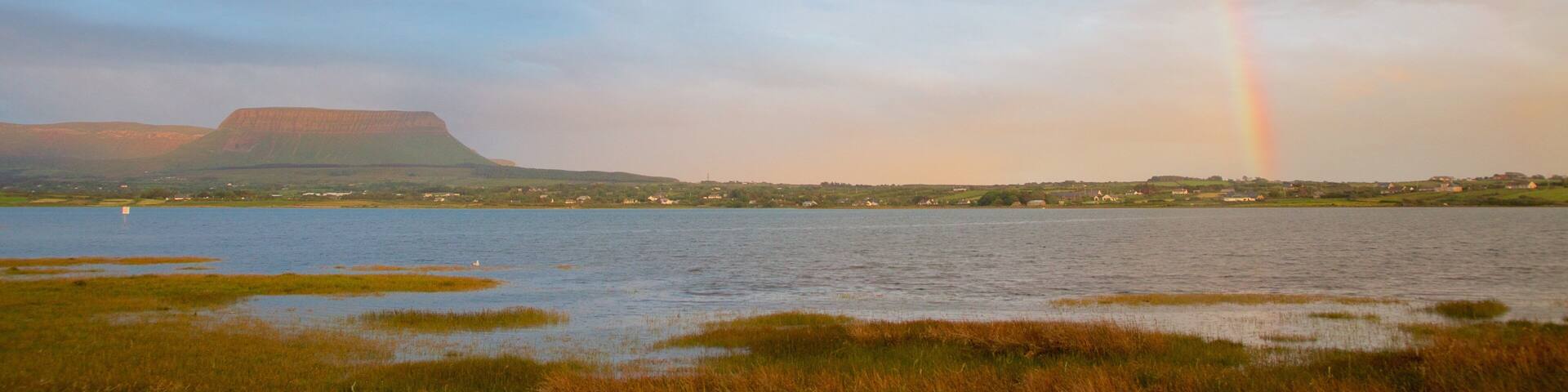 Ben Bulben featuring mountains, tranquil scenes and a river or creek