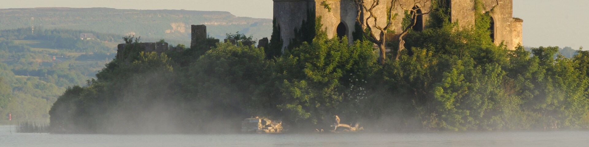 mc dermotts castle island at sunrise in summer, lough key lake, ireland