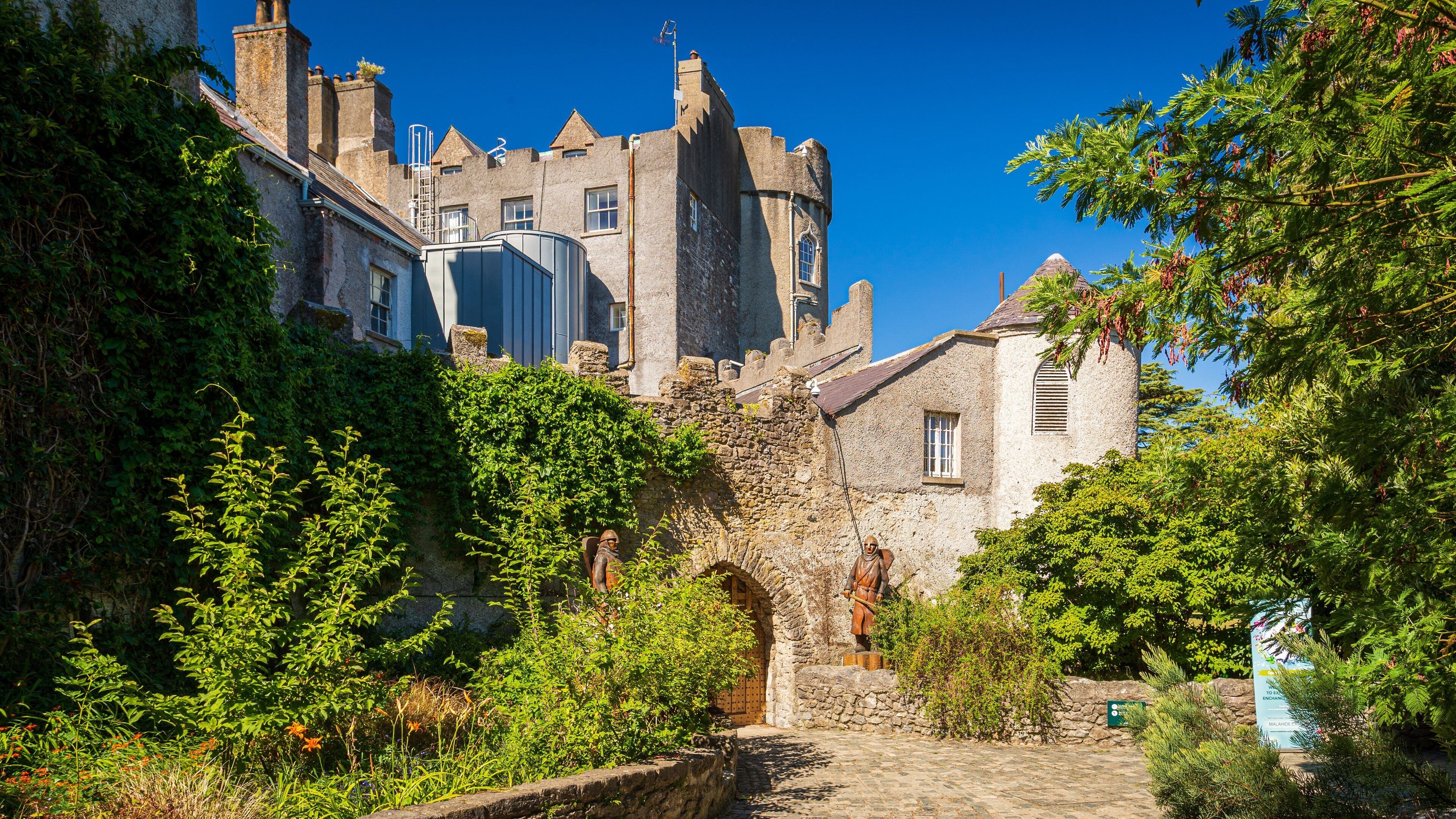 Malahide Castle featuring heritage architecture and a castle