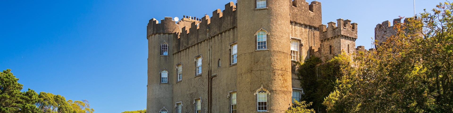 Malahide Castle which includes heritage architecture and a castle