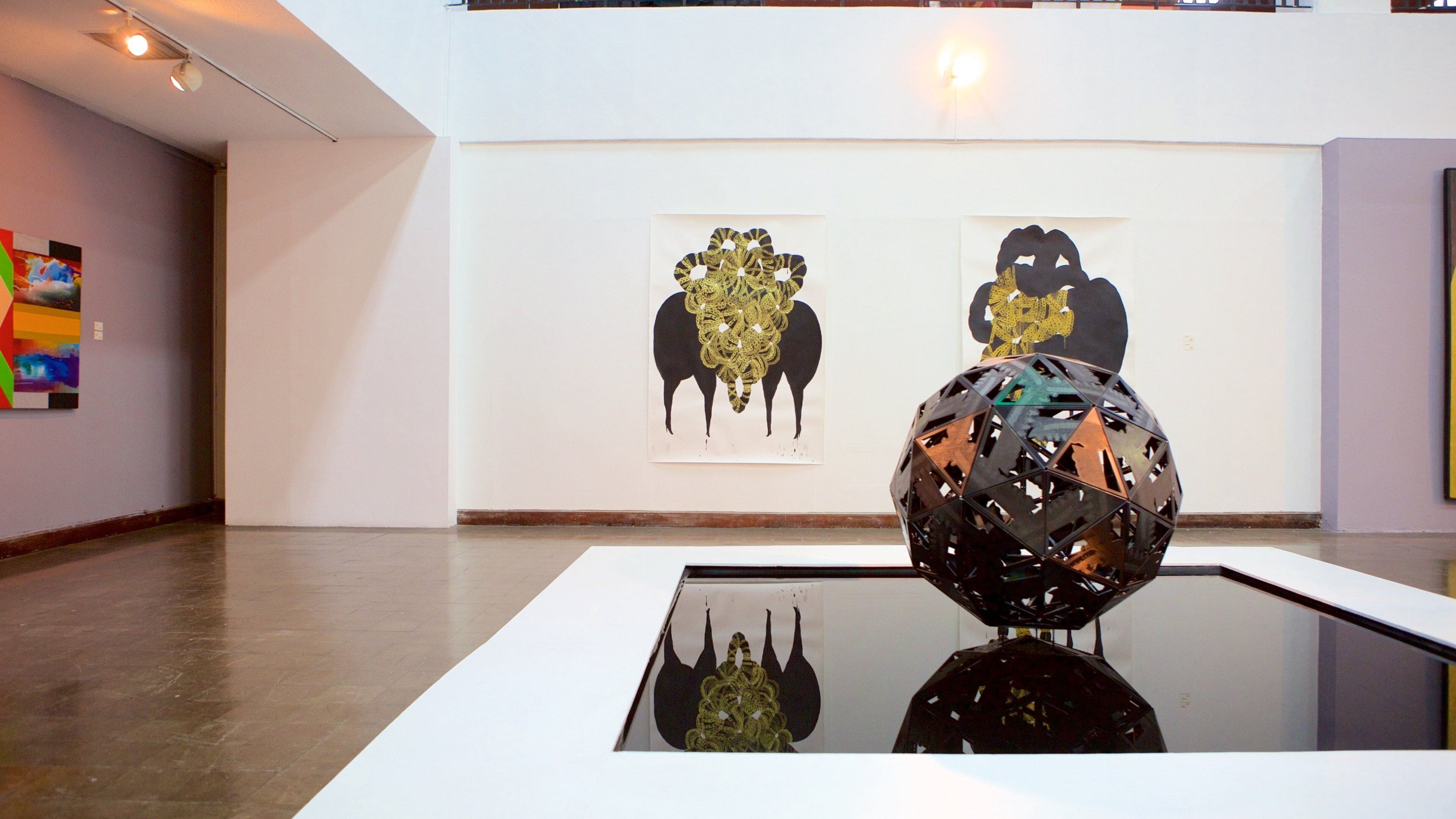 National Gallery of Jamaica featuring art and interior views