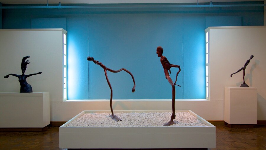 National Gallery of Jamaica which includes interior views and a statue or sculpture