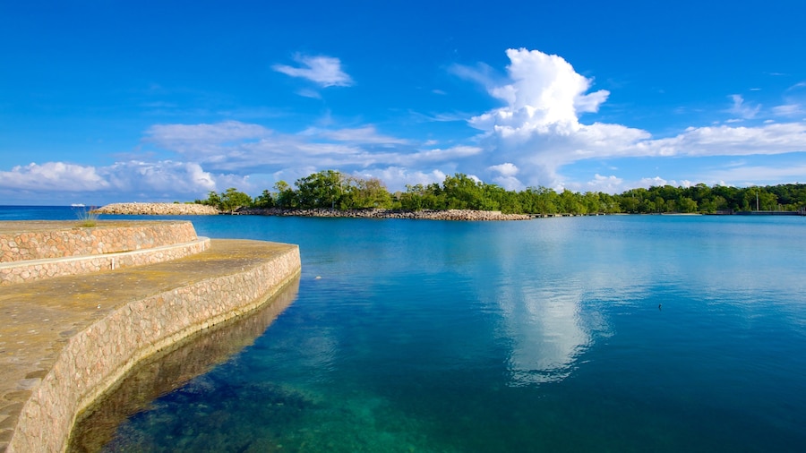 James Bond Beach which includes a bay or harbor and tropical scenes