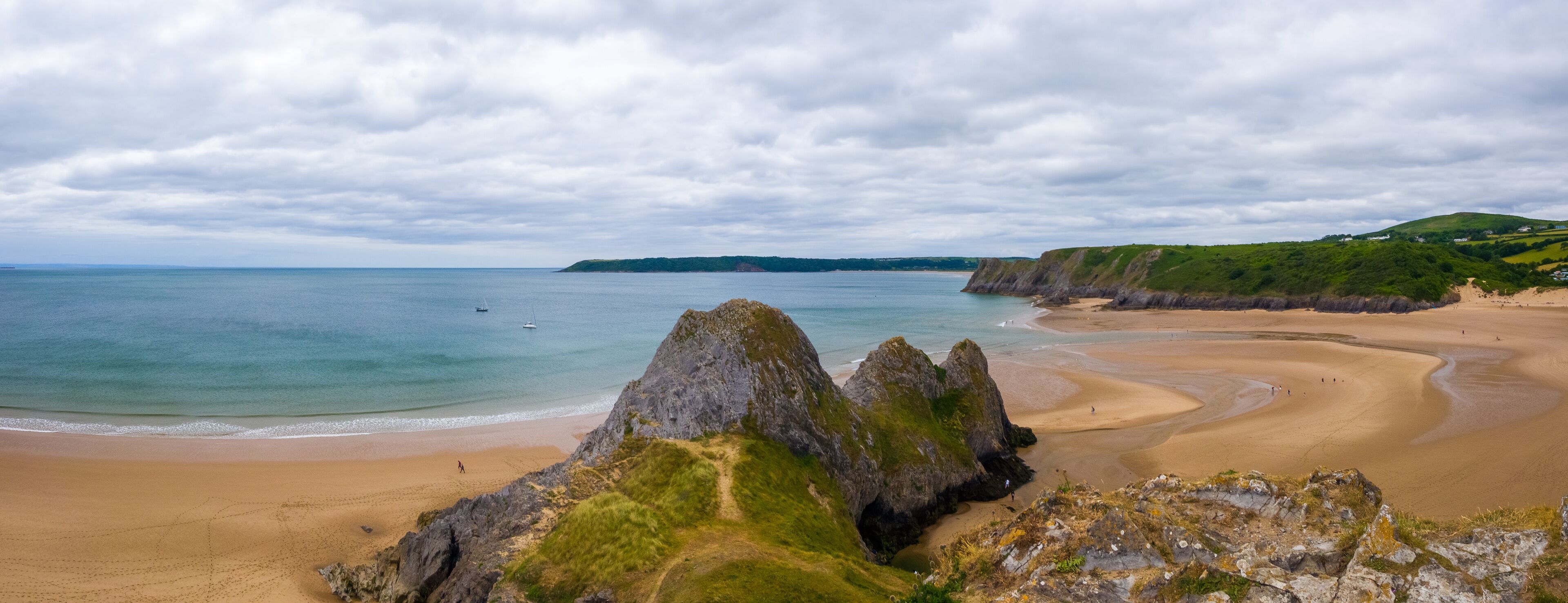Three Cliffs and the Bay viewed from a hilltop (Wales, United Kingdom, in summer)