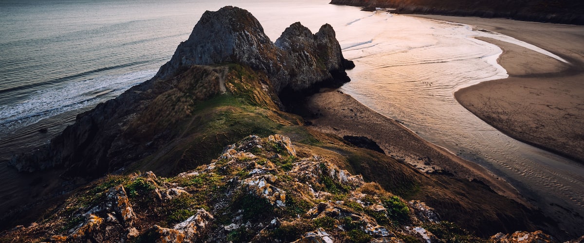 Sunset at Three Cliffs Bay, Gower, Peninsula, Swansea, South Wales, UK