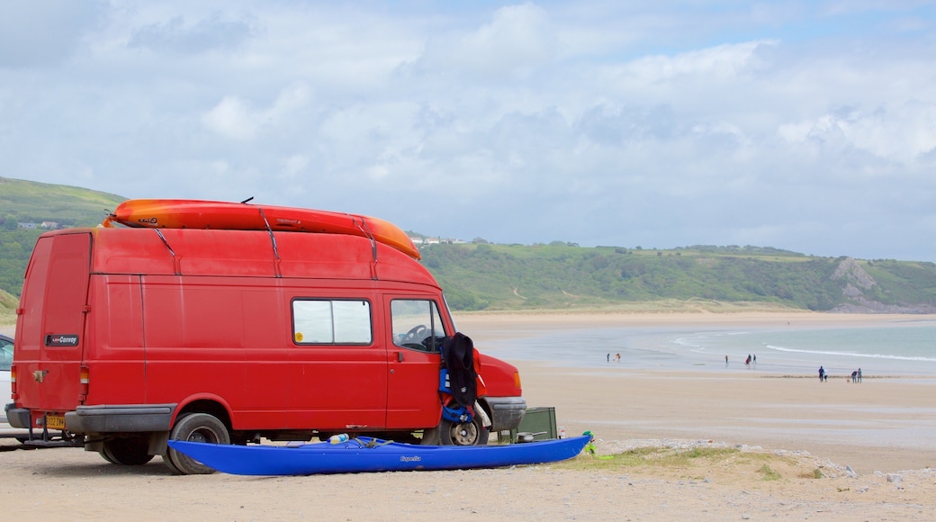 Oxwich Bay Beach showing touring and a beach