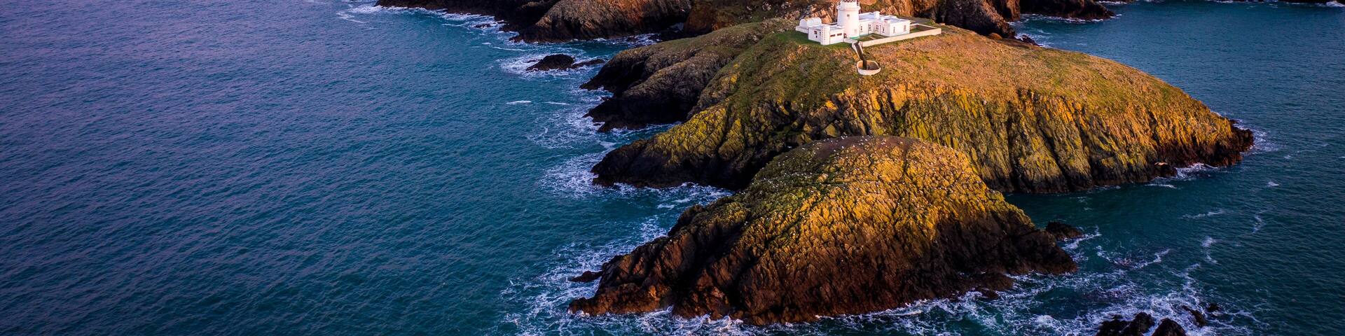 Aerial view of Strumble Head Lighthouse, near Goodwick, Pembrokeshire, Dyfed, Wales, UK