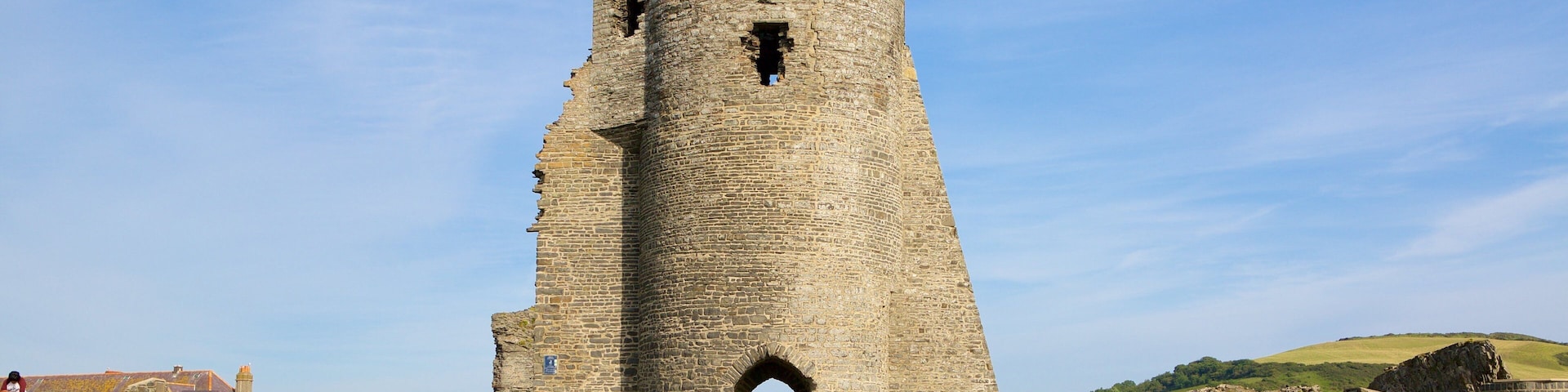 Aberystwyth Castle featuring landscape views, a bridge and chateau or palace