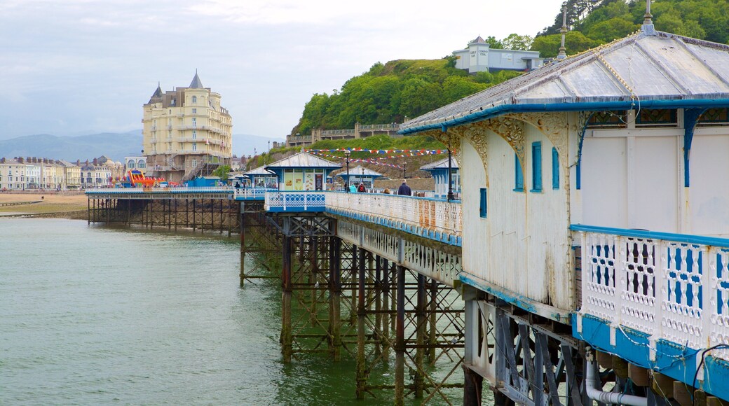 Llandudno Pier which includes general coastal views