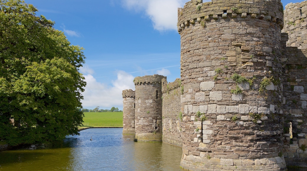 Beaumaris Castle showing a river or creek, heritage elements and château or palace