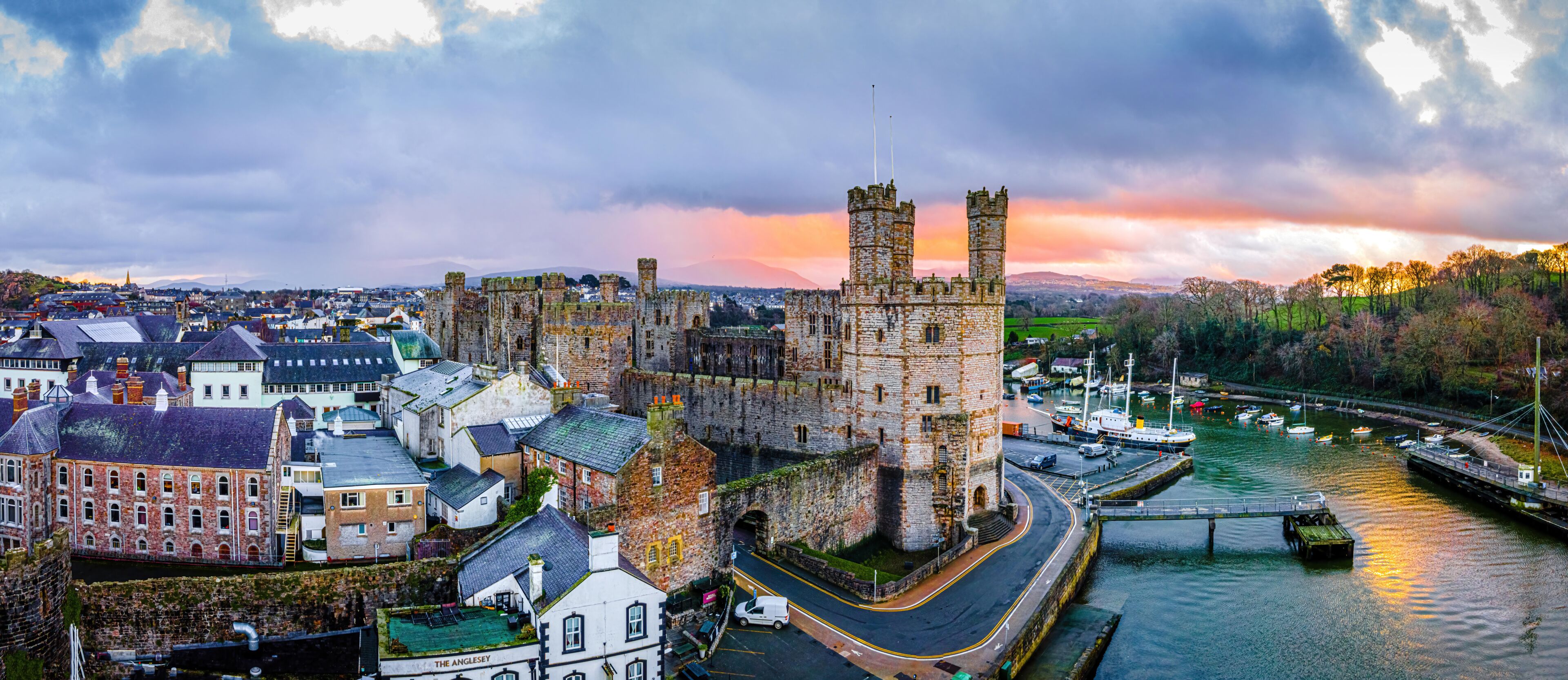 Aerial view of Caernarfon Castle, a medieval fortress in Caernarfon, Gwynedd, north-west Wales