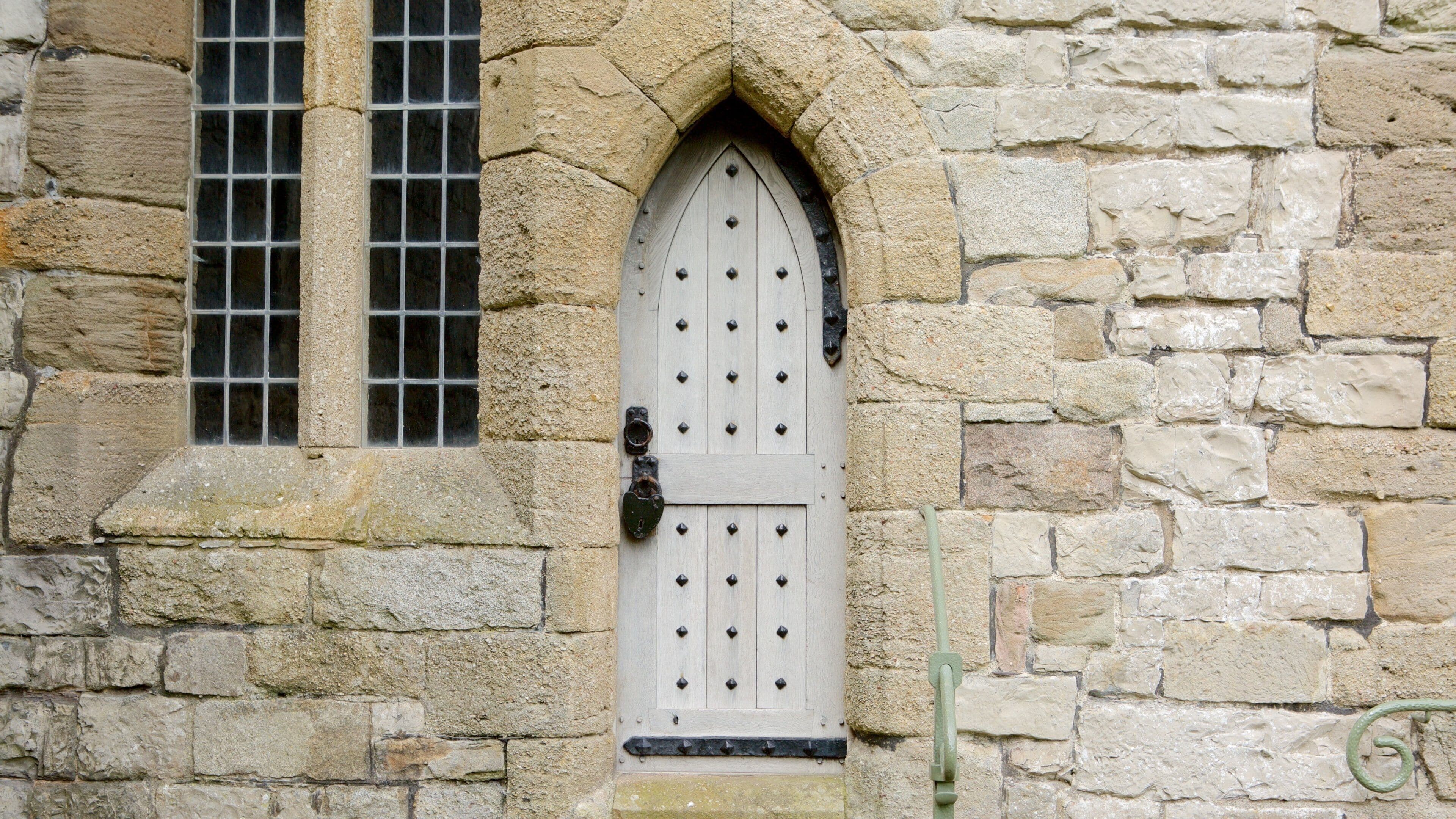 Caernarfon Castle which includes heritage elements and a house