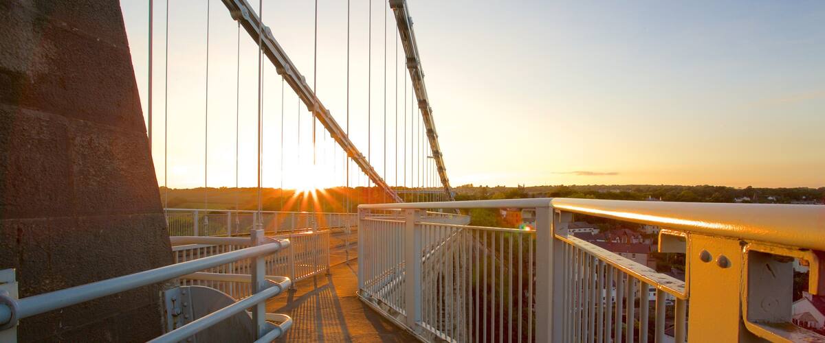 Menai Bridge showing a sunset and a bridge