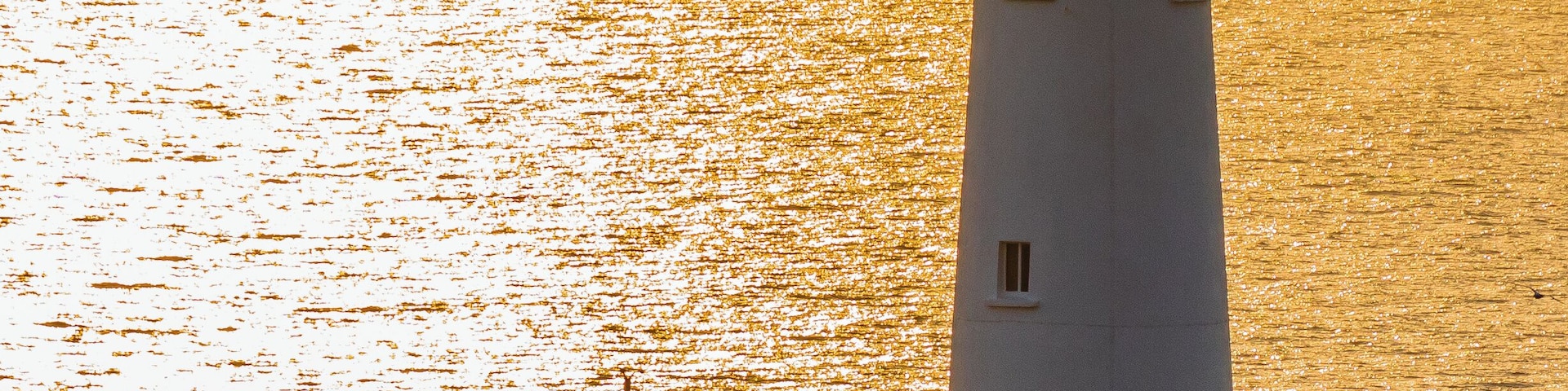 A shot taken of South Stacks Lighthouse, Anglesea, N.Wales whilst waiting for the sun to set. Unfortunately this is as good as it got.