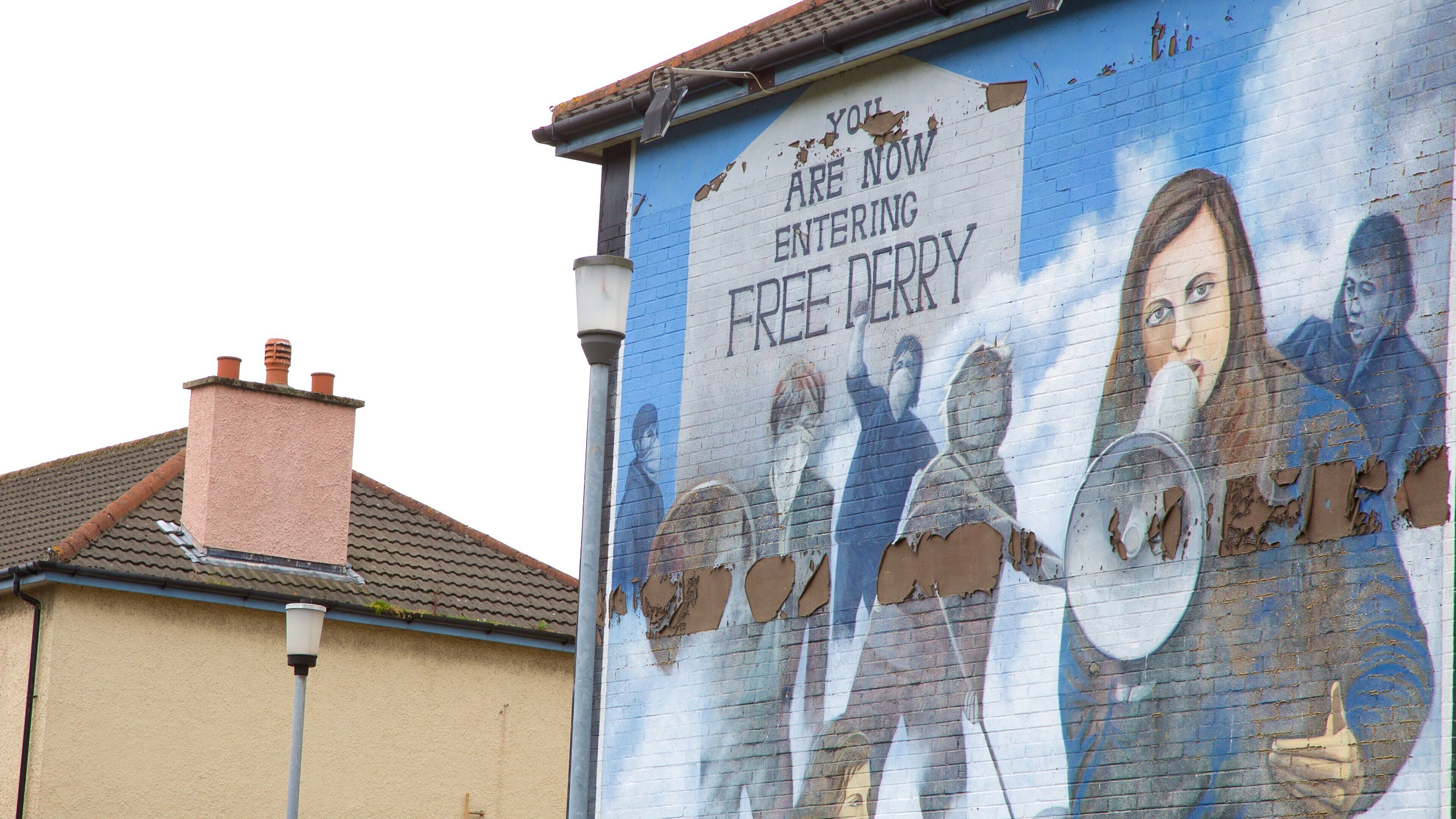 You are Now Entering Free Derry Mural showing outdoor art and signage