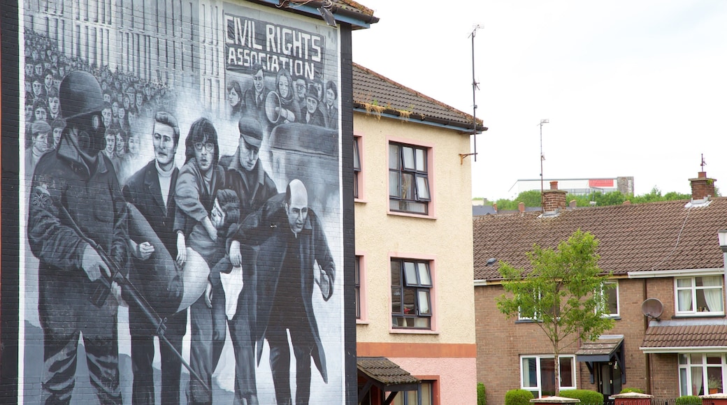 You are Now Entering Free Derry Mural featuring signage and outdoor art