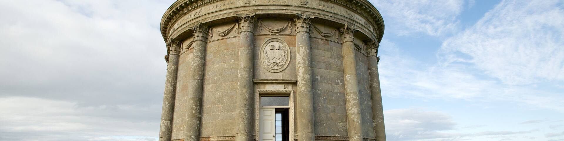 Mussenden Temple which includes heritage elements and a temple or place of worship