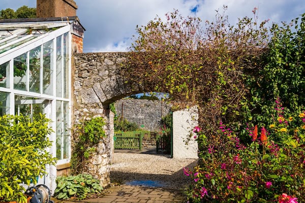 Glenarm Castle which includes a park and wildflowers