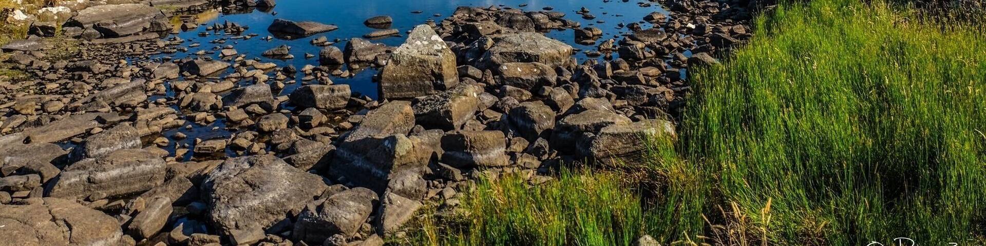 Walking at Fair Head near Ballycastle and discovering this beautiful scenery. The Lough even has a name: Lough Doo.