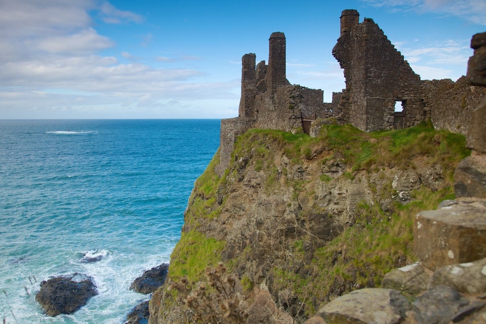 A coastal ruin with a view of the ocean.