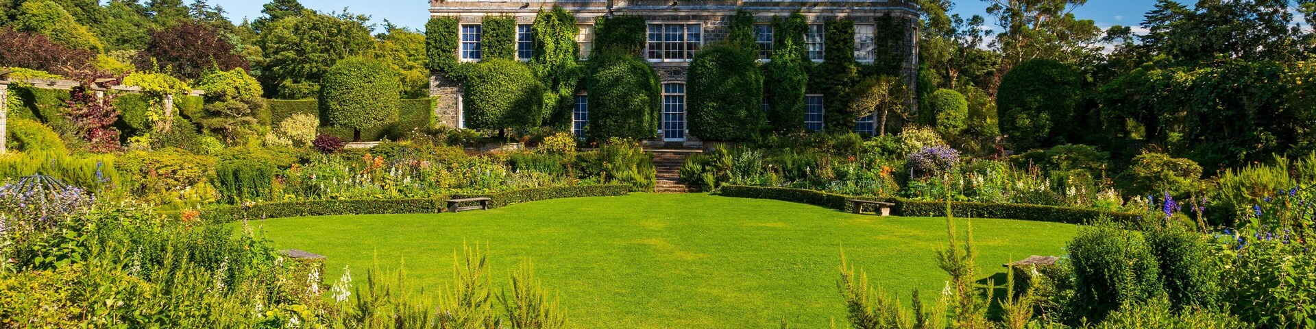 Mount Stewart House and Gardens which includes heritage elements, a house and a garden