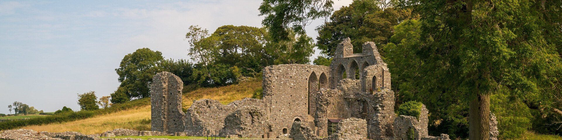 Inch Abbey which includes a ruin and heritage elements