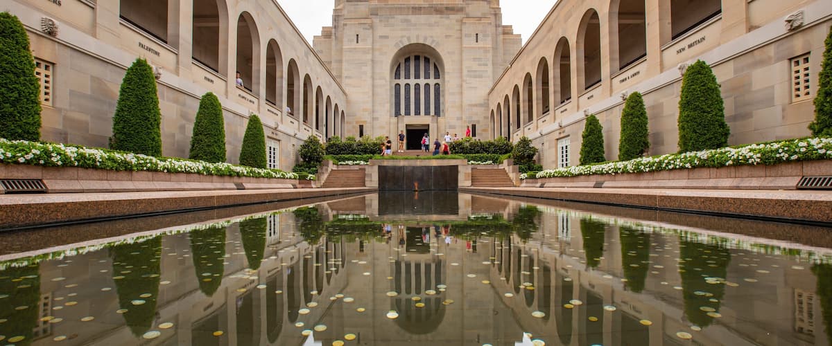 Australian War Memorial showing a pond and heritage architecture