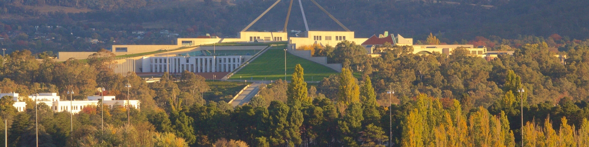 Parliament House showing an administrative buidling and landscape views