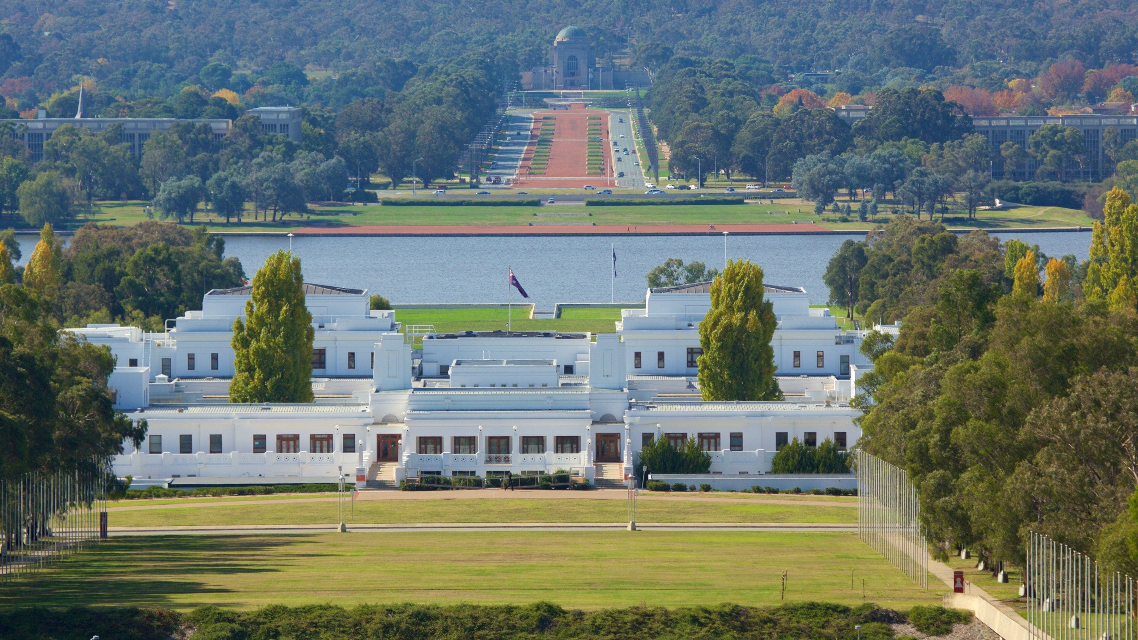 Parliament House which includes a lake or waterhole and an administrative buidling