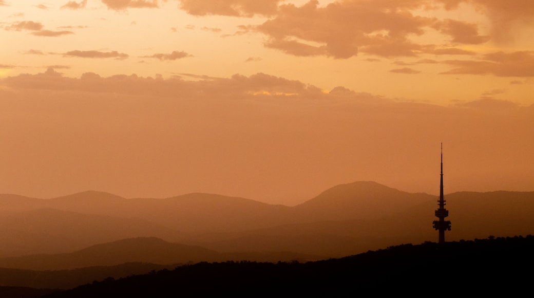 Telstra Tower featuring a sunset and landscape views