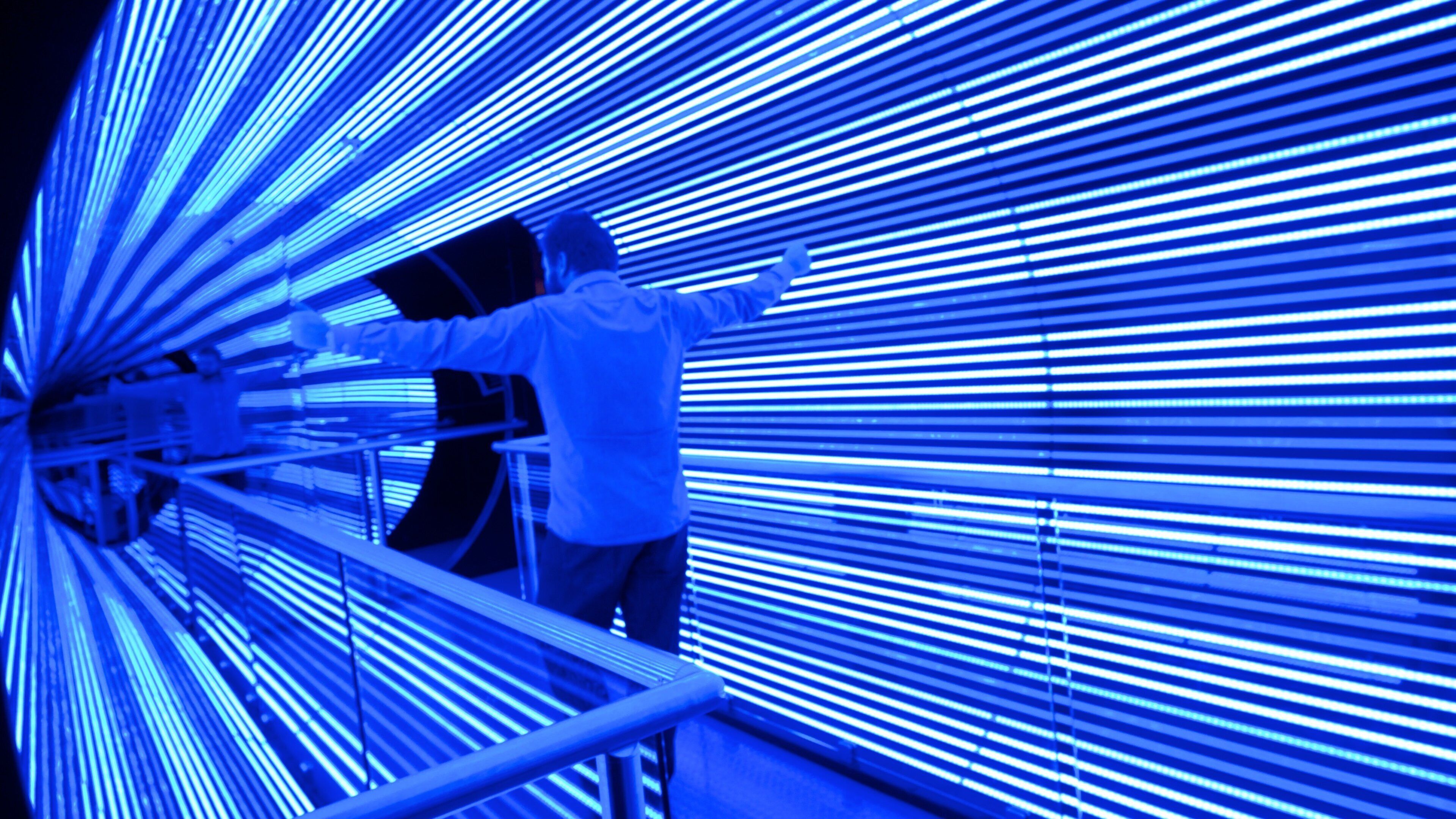 Questacon which includes interior views as well as an individual male