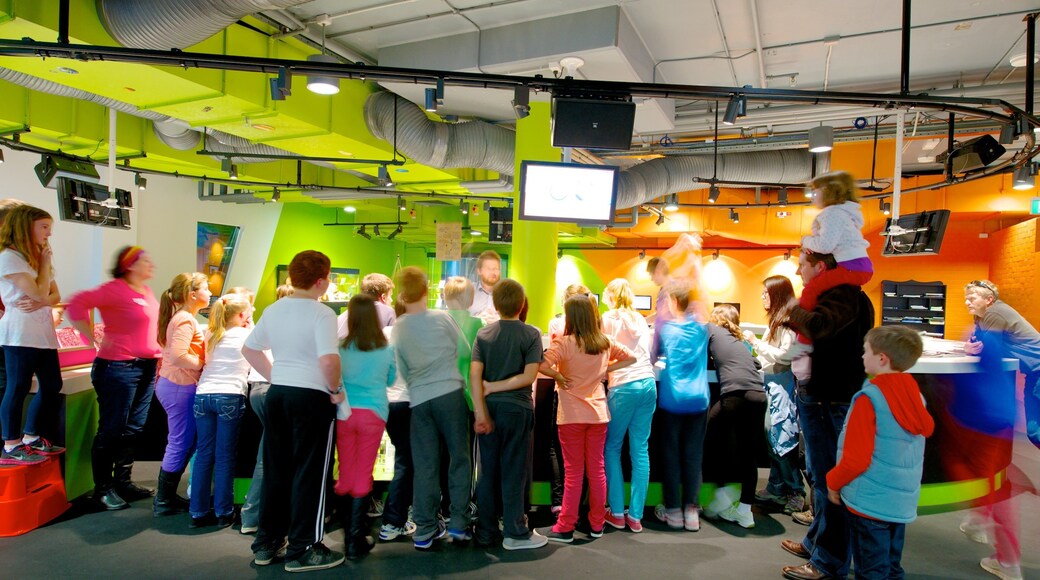 Questacon which includes interior views as well as a large group of people