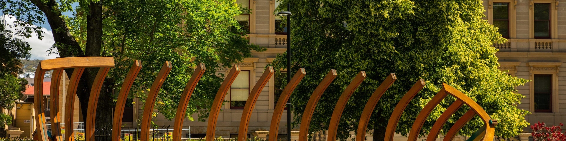 Franklin Square featuring outdoor art and a park