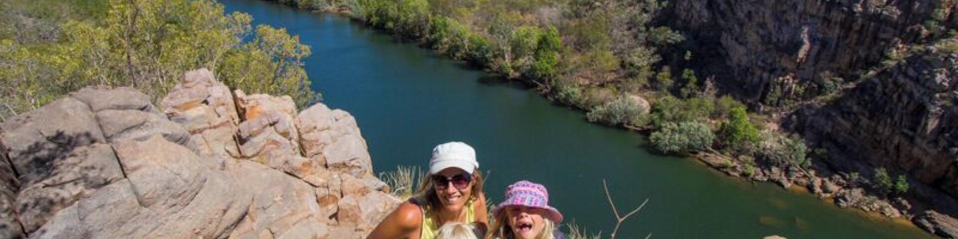 A river, rocky terrain, and a clear sky.