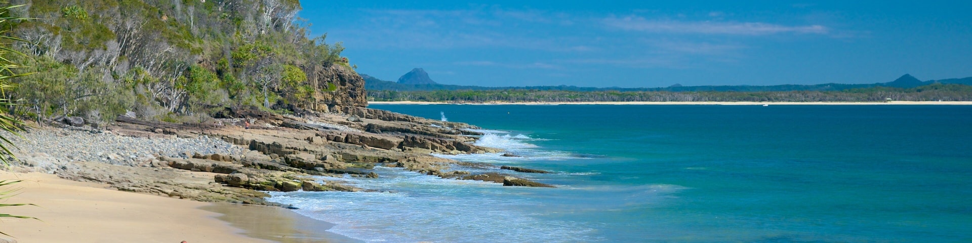 Noosa National Park which includes landscape views and a beach