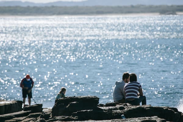 Mooloolaba Beach featuring general coastal views and rugged coastline as well as a couple