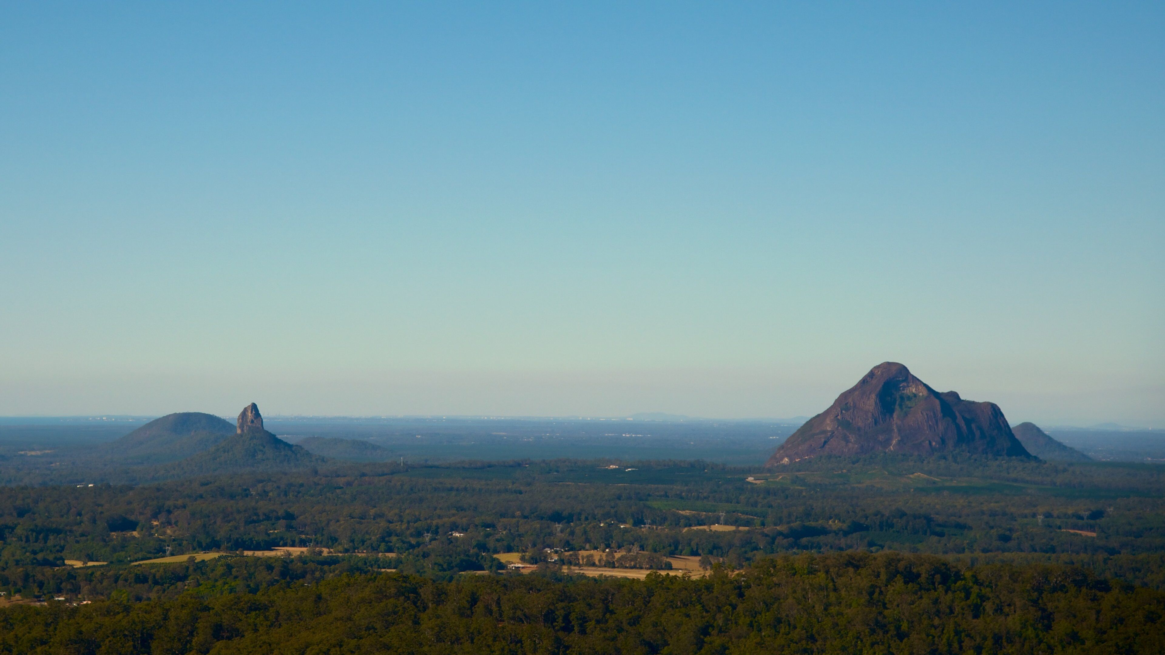 Glasshouse Mountains National Park which includes mountains, landscape views and tranquil scenes