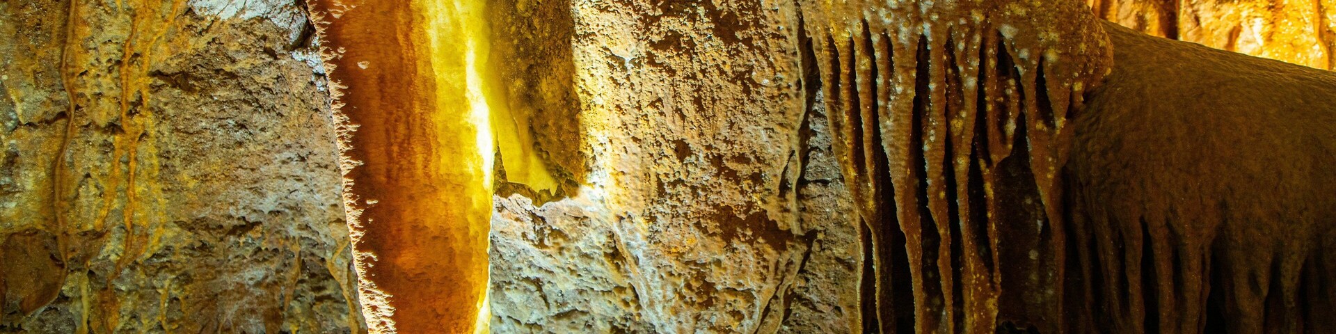 Stalactites and stalagmites in a cave.