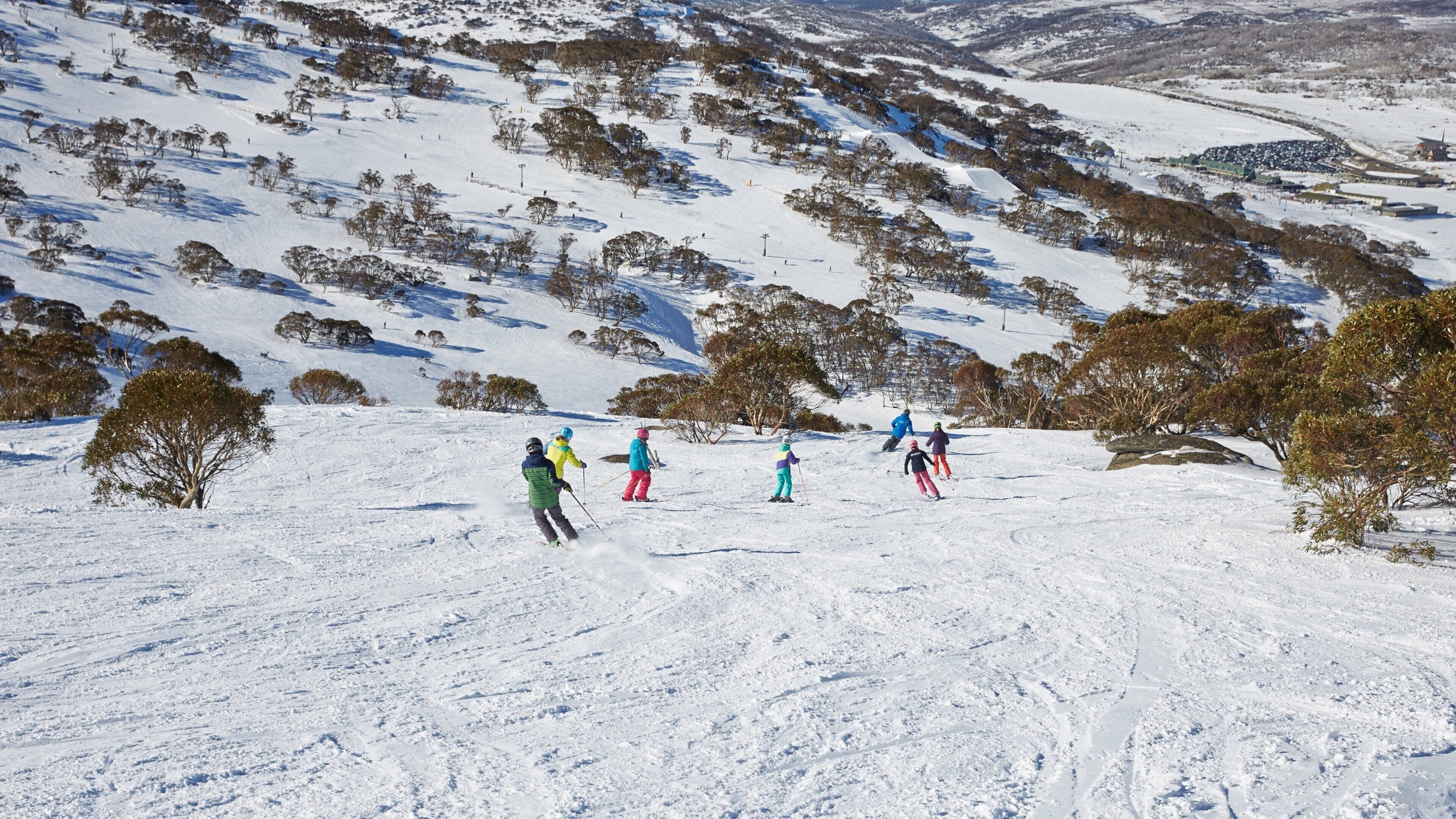 Perisher Ski Resort which includes snow and snow skiing as well as a small group of people