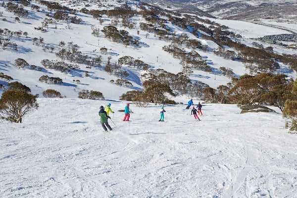 Perisher Ski Resort featuring snow skiing and snow as well as a small group of people