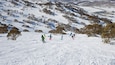 Perisher Ski Resort which includes snow and snow skiing as well as a small group of people