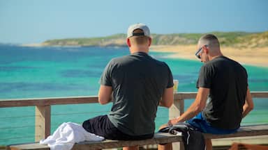 Prevelly Beach which includes a beach as well as a small group of people