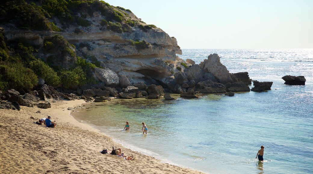 Prevelly Beach showing rocky coastline, a beach and a bay or harbor