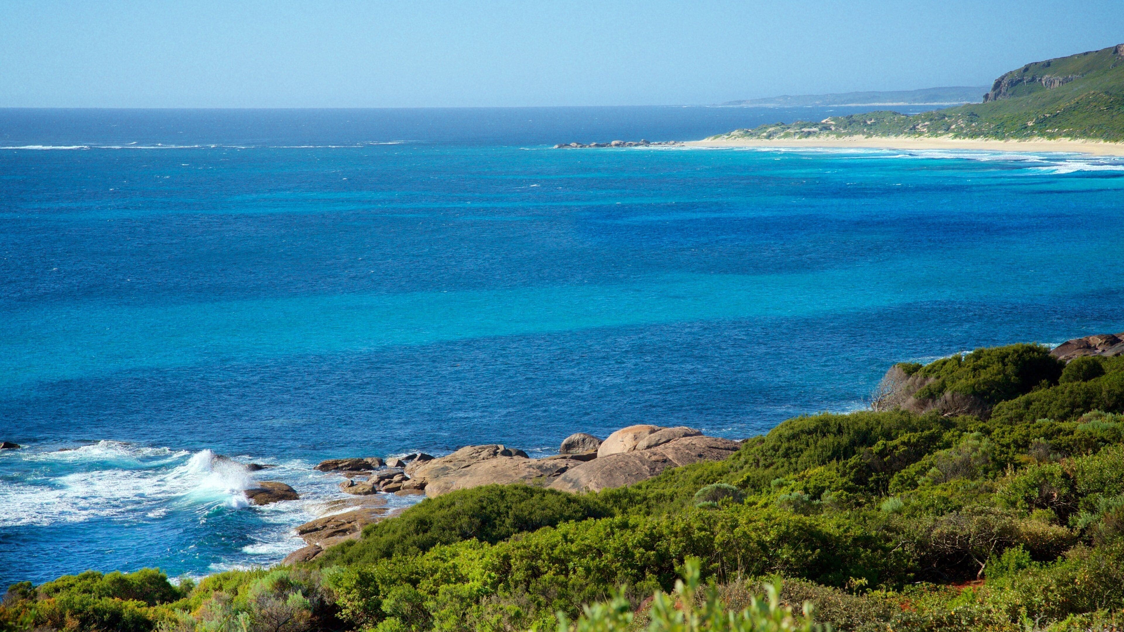 Conto Beach featuring a beach and rugged coastline
