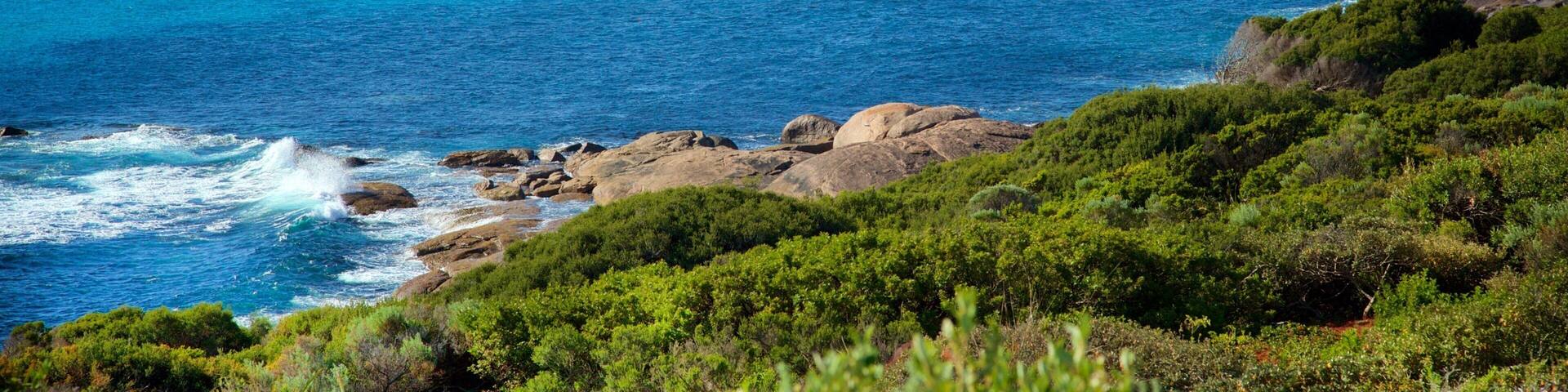 Conto Beach which includes a sandy beach and rocky coastline