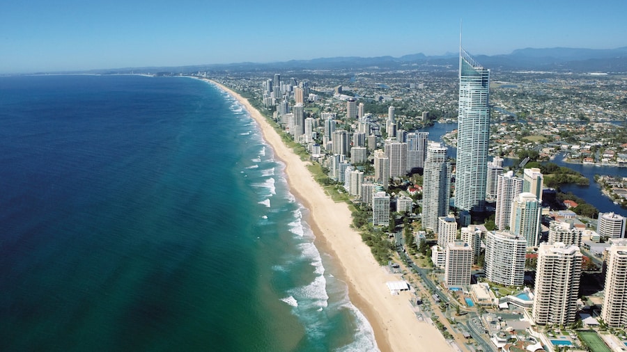 Surfers Paradise Beach showing skyline, a beach and general coastal views
