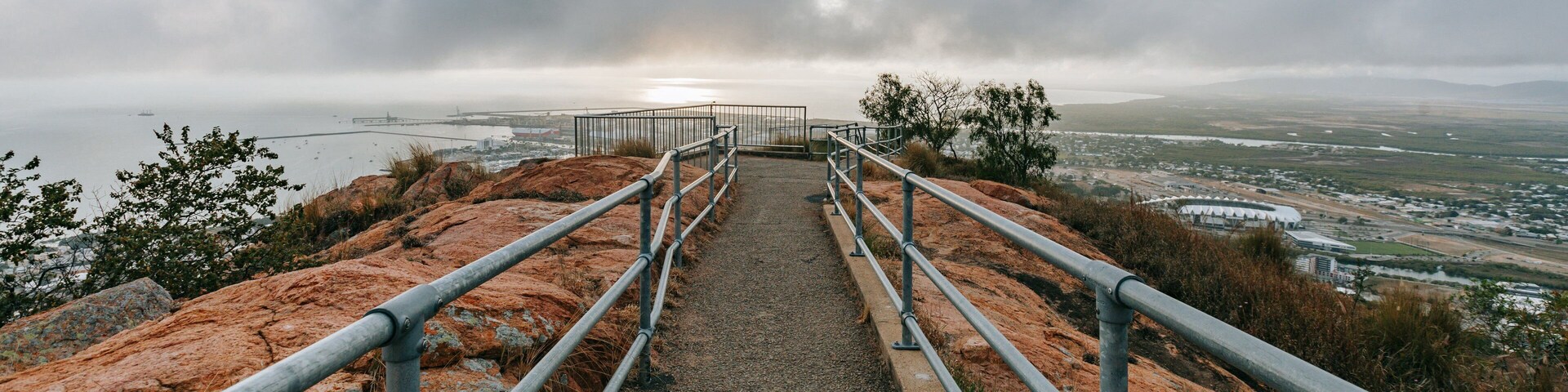 Castle Hill featuring a sunset, mist or fog and views