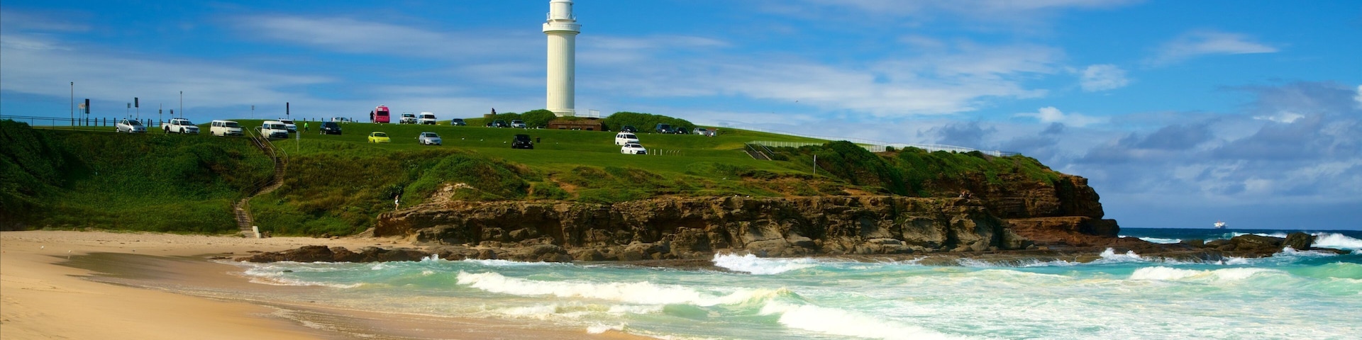 Wollongong South Beach which includes general coastal views and a beach