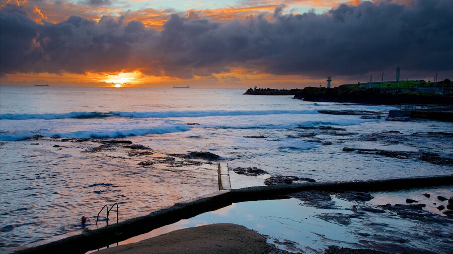 Wollongong North Beach featuring a sunset, general coastal views and a sandy beach