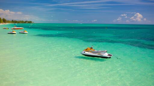 Taino Beach showing jet skiing and general coastal views